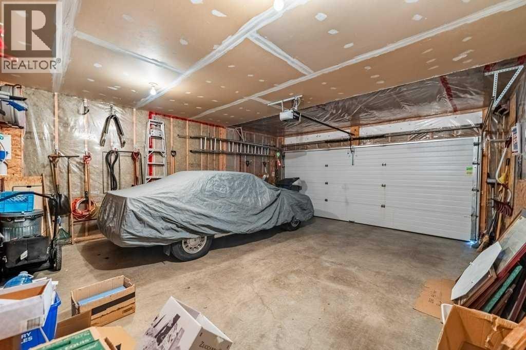 1008 Highland Green Drive NW, High River, Alberta  T1V 1V8 - Photo 32 - A2285885