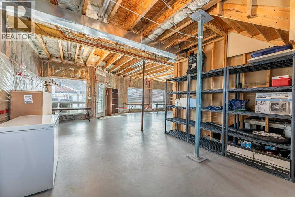 1008 Highland Green Drive NW, High River, Alberta  T1V 1V8 - Photo 36 - A2285885