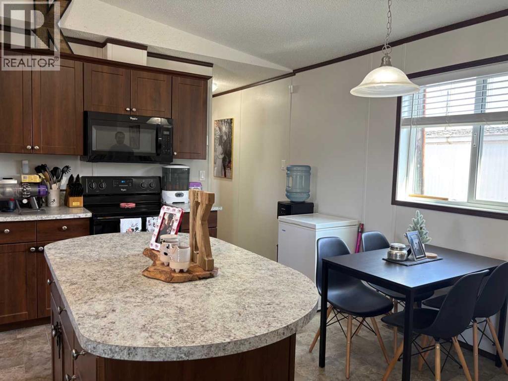 71, 4000 Minto Street, Penhold, Alberta  T0M 1R0 - Photo 7 - A2298878