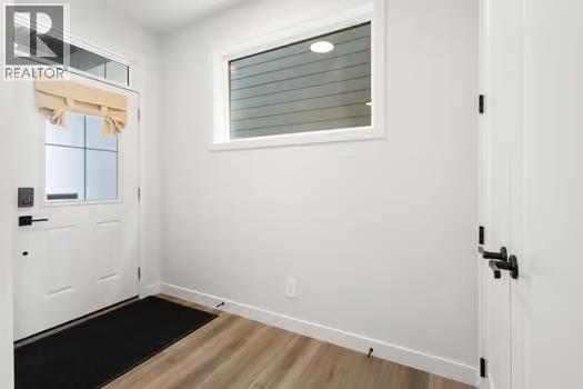 67 Royston Heath Nw, Calgary, Alberta  T3L 0K3 - Photo 3 - A2291573