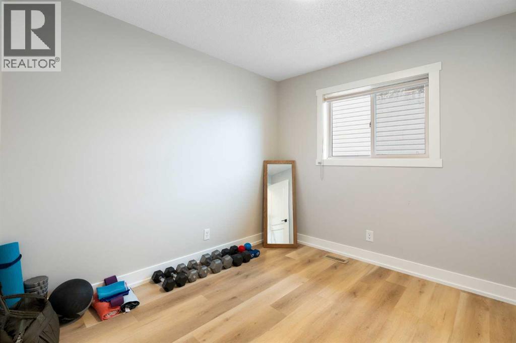 111 Woodside Circle NW, Airdrie, Alberta  T4B 2J8 - Photo 19 - A2283388