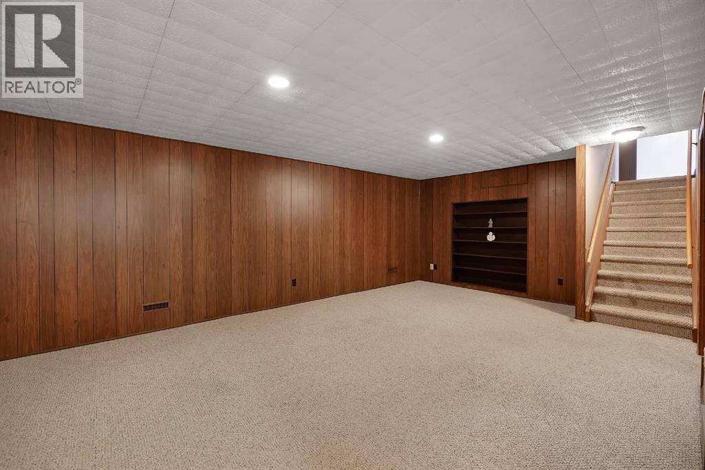 1102 Lake Christina Way SE, Calgary, Alberta  T2J 2R3 - Photo 40 - A2296764