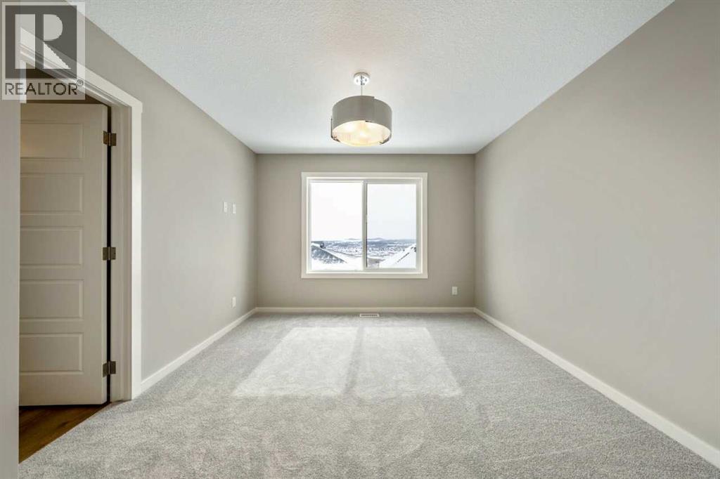 370 Heritage Boulevard, Cochrane, Alberta  T4C 0L3 - Photo 13 - A2294884