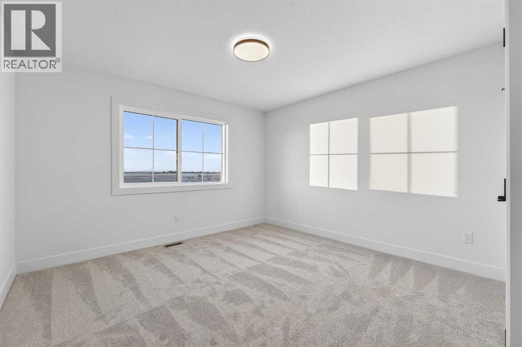 107 North Bridges Garden, Langdon, Alberta  T0J 1X3 - Photo 34 - A2288969