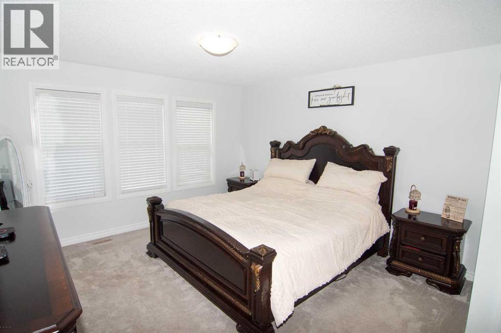 149 Cimarron Vista Crescent, Okotoks, Alberta  T1S 0K3 - Photo 22 - A2276499