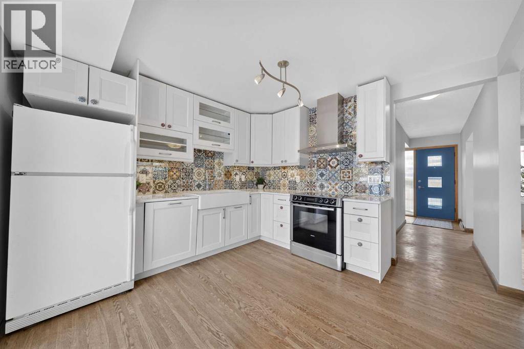 23 Hyslop Drive Sw, Calgary, Alberta  T2V 3A2 - Photo 9 - A2298506