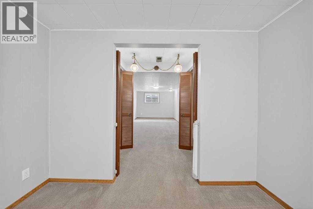 23 Hyslop Drive Sw, Calgary, Alberta  T2V 3A2 - Photo 26 - A2298506