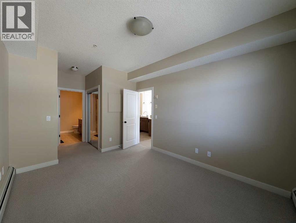 203, 35 Aspenmont Heights Sw, Calgary, Alberta  T3H 0E5 - Photo 10 - A2291530