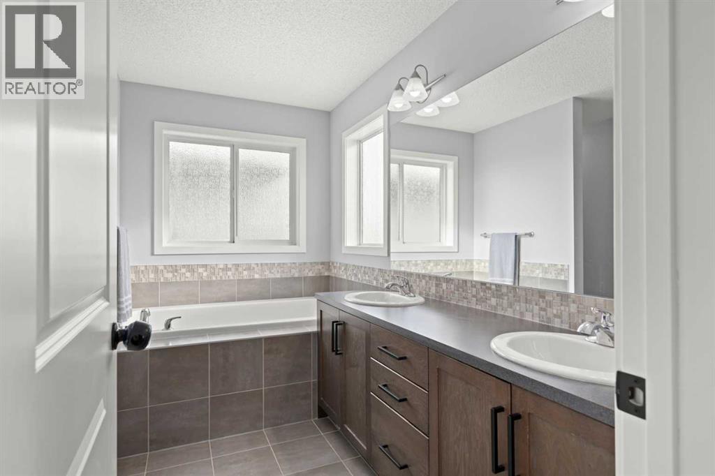 160 Reunion Grove NW, Airdrie, Alberta  T4B 0Z3 - Photo 31 - A2298726