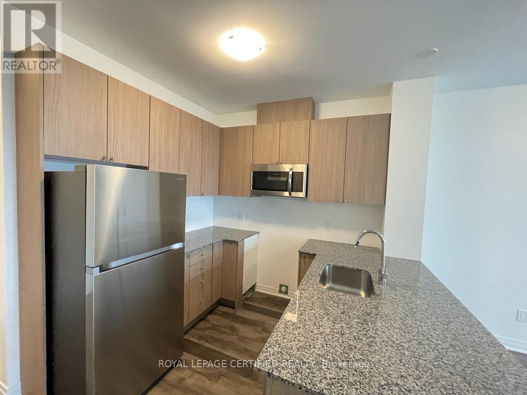 522 - 460 Gordon Krantz Avenue, Milton, Ontario  L9E 1Z2 - Photo 2 - W12956682