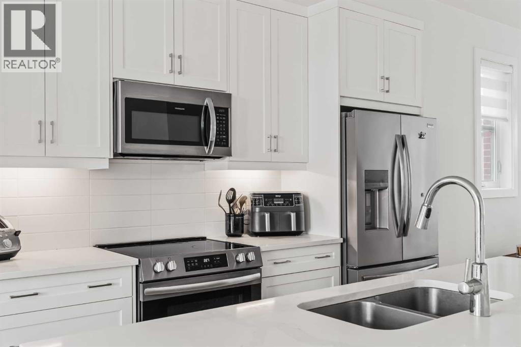 86 Spring Willow Close SW, Calgary, Alberta  T3H 6E8 - Photo 12 - A2298823