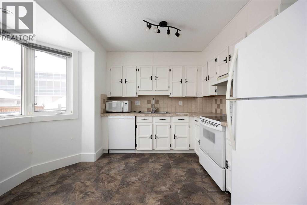 218 Maclaren Crescent, Fort Mcmurray, Alberta  T9K 1J8 - Photo 7 - A2292549