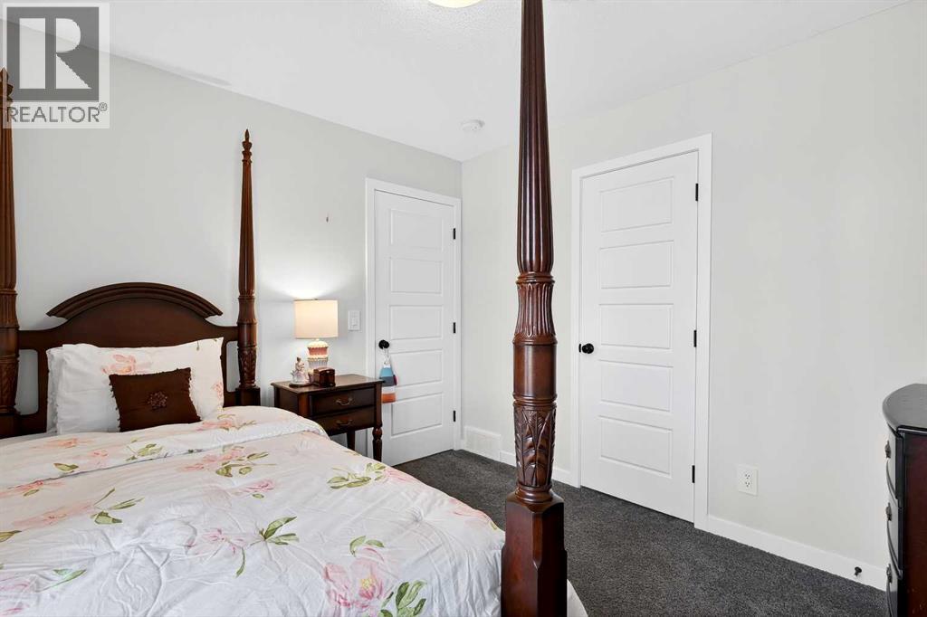 825 Reynolds Manor SW, Airdrie, Alberta  T4B 5G2 - Photo 32 - A2288924