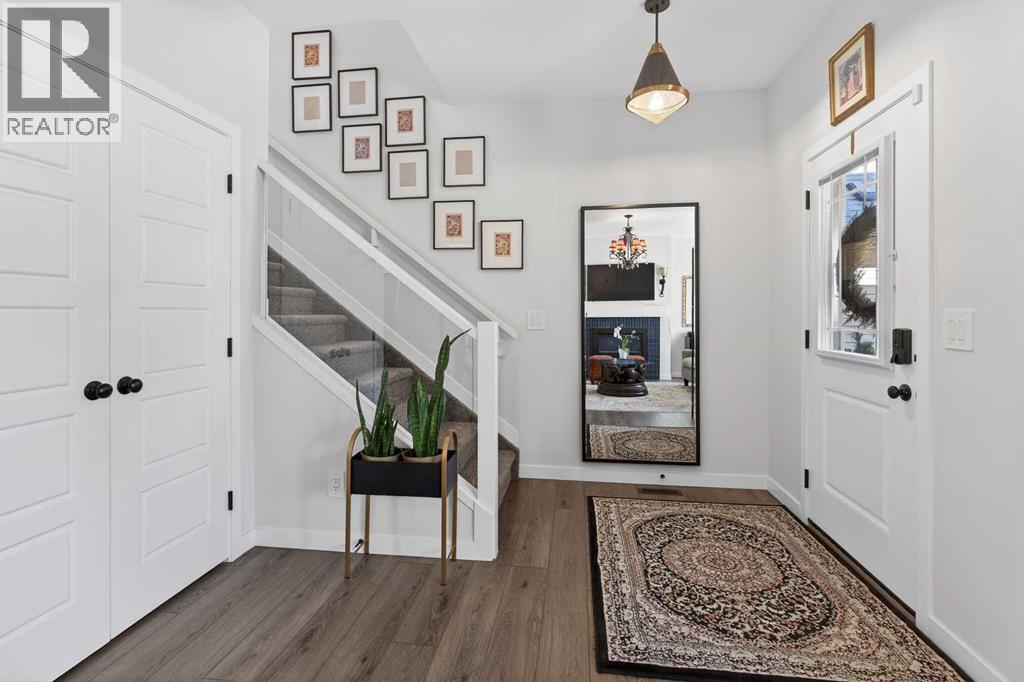 825 Reynolds Manor SW, Airdrie, Alberta  T4B 5G2 - Photo 2 - A2288924