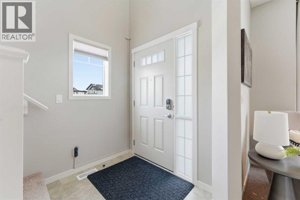 413 Nolanfield Way NW, Calgary, Alberta  T3R 0L8 - Photo 2 - A2298389