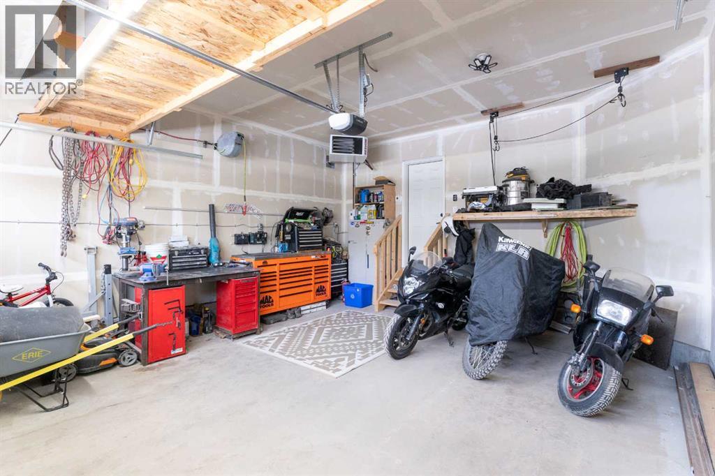 211 Mustang Street, Cochrane, Alberta  T4C 2P9 - Photo 41 - A2298368