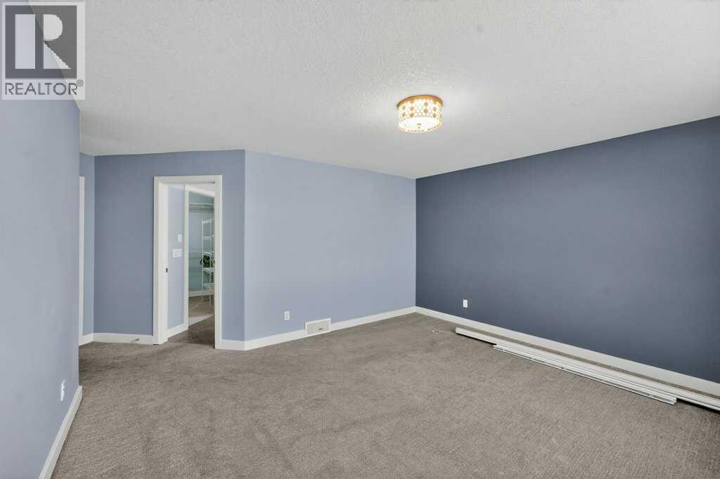 171 East Lakeview Court E, Chestermere, Alberta  T1X 1W2 - Photo 36 - A2296411