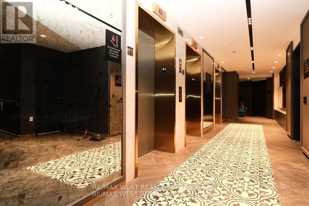 822 - 395 Dundas Street W, Oakville (Go Glenorchy), Ontario  L6M 5R8 - Photo 4 - W12957016