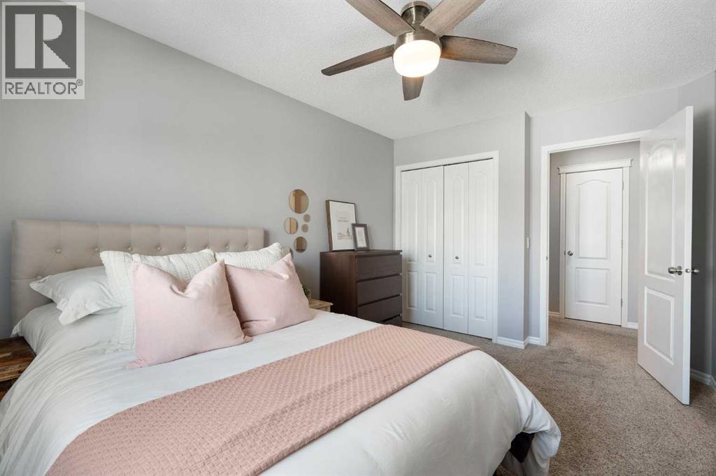 142 Coopers Bay Sw, Airdrie, Alberta  T4B 3K2 - Photo 27 - A2298253