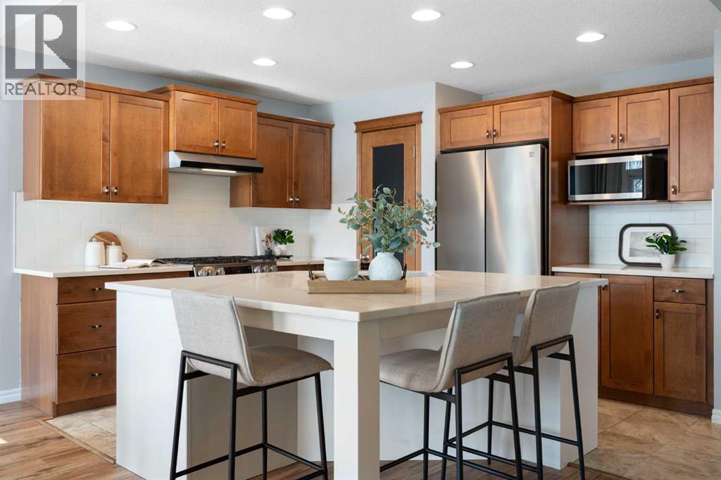 142 Coopers Bay Sw, Airdrie, Alberta  T4B 3K2 - Photo 7 - A2298253