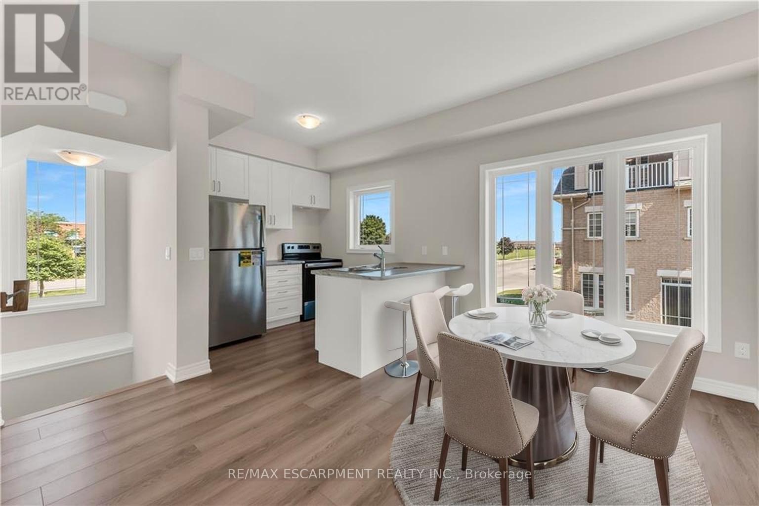 57 - 19 Picardy Drive, Hamilton, Ontario  L8J 0M7 - Photo 2 - X12957004