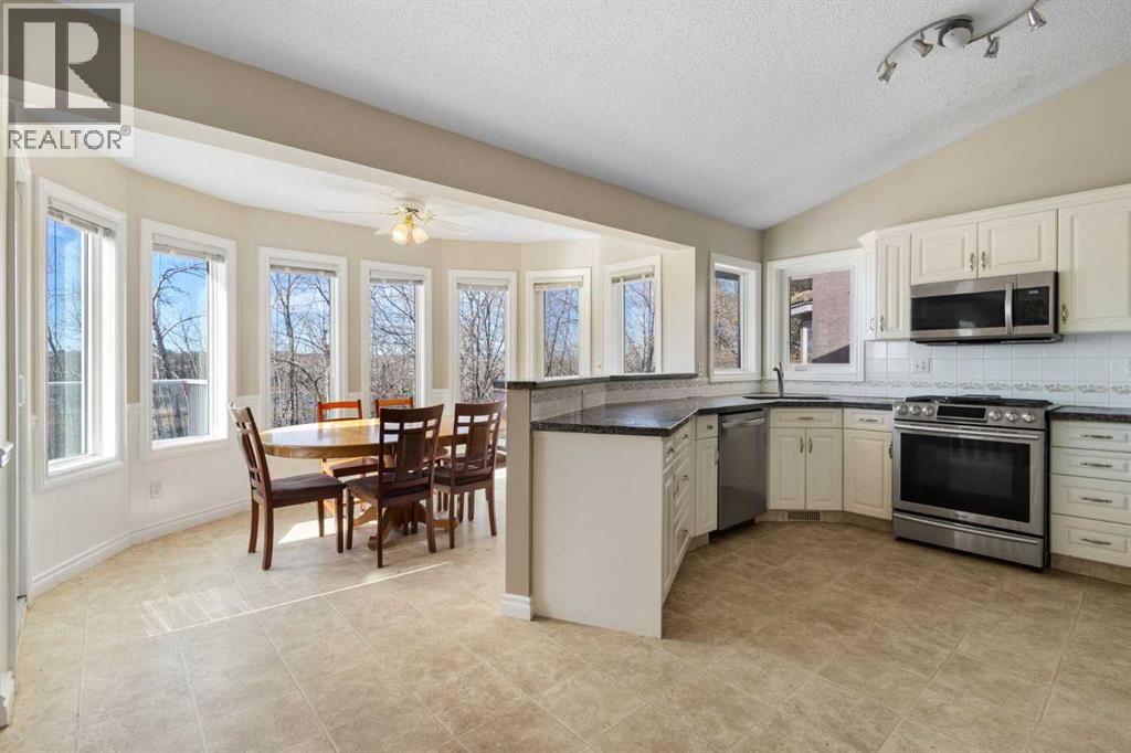 103 Riverside Way Se, Calgary, Alberta  T2C 3V8 - Photo 6 - A2295313