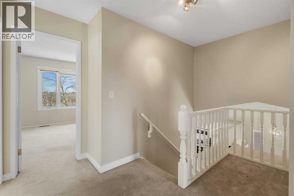 103 Riverside Way Se, Calgary, Alberta  T2C 3V8 - Photo 23 - A2295313