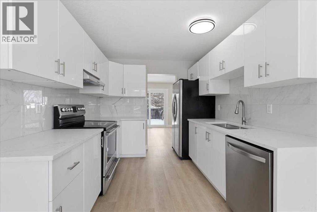 172 Abinger Crescent Ne, Calgary, Alberta  T2A 6L3 - Photo 4 - A2297799