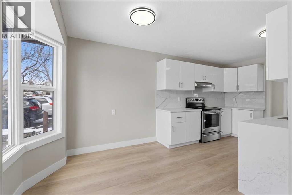 172 Abinger Crescent Ne, Calgary, Alberta  T2A 6L3 - Photo 3 - A2297799