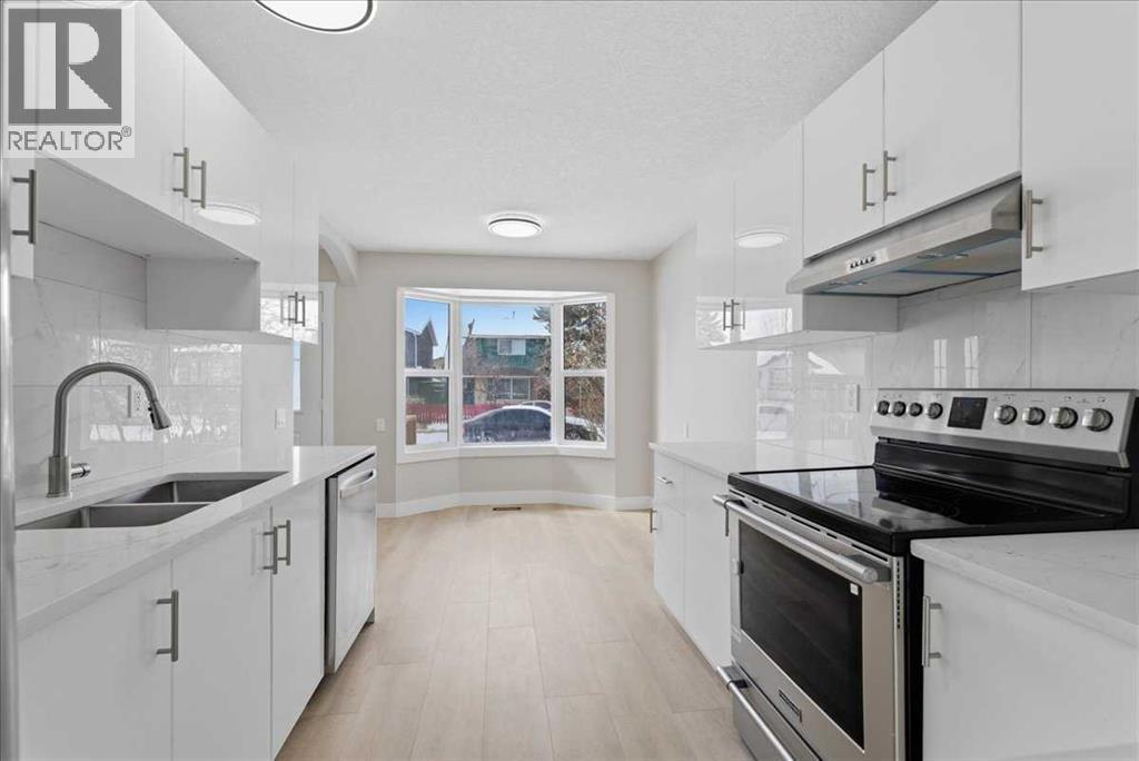 172 Abinger Crescent Ne, Calgary, Alberta  T2A 6L3 - Photo 6 - A2297799