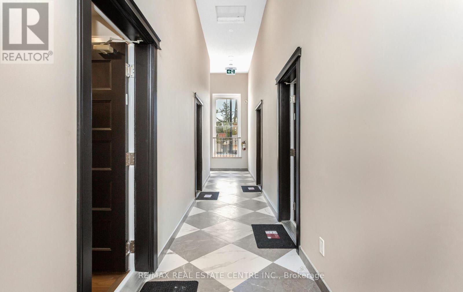 204 - 271 Queen Street S, Mississauga, Ontario  L5M 1L9 - Photo 4 - W12957342