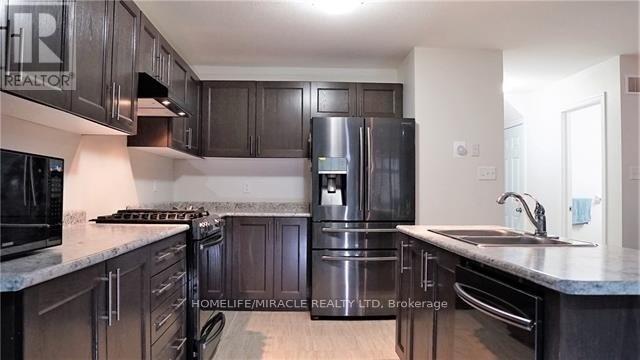 120 South Creek Drive, Kitchener, Ontario  N2P 2N3 - Photo 2 - X12957336