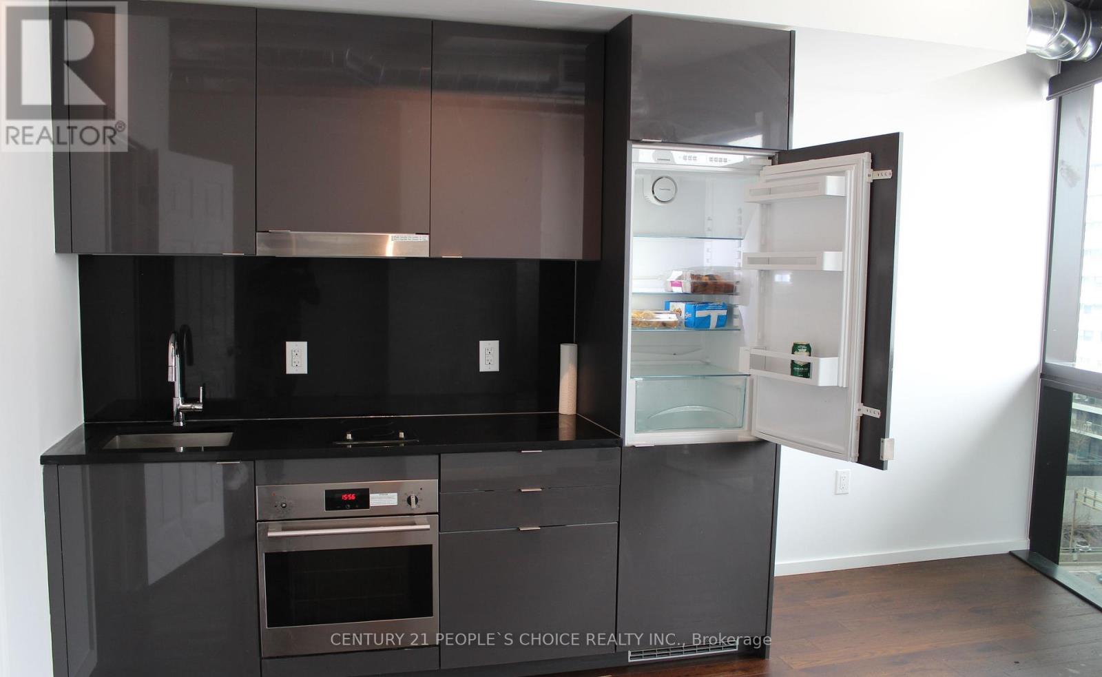 910 - 21 Lawren Harris Square, Toronto, Ontario  M5A 0T4 - Photo 5 - C12957404