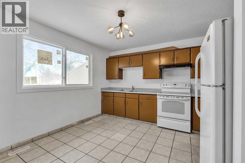 318 Marlborough Way Ne, Calgary, Alberta T2A 6R9 - Photo 6 - A2286371