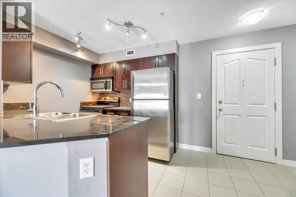 309, 7130 80 Avenue Ne, Calgary, Alberta T3J 0N5 - Photo 4 - A2299055