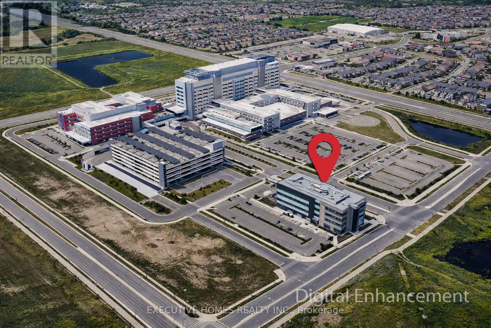 424 - 3075 Hospital Gate, Oakville, Ontario  L6M 1M1 - Photo 1 - W12957422