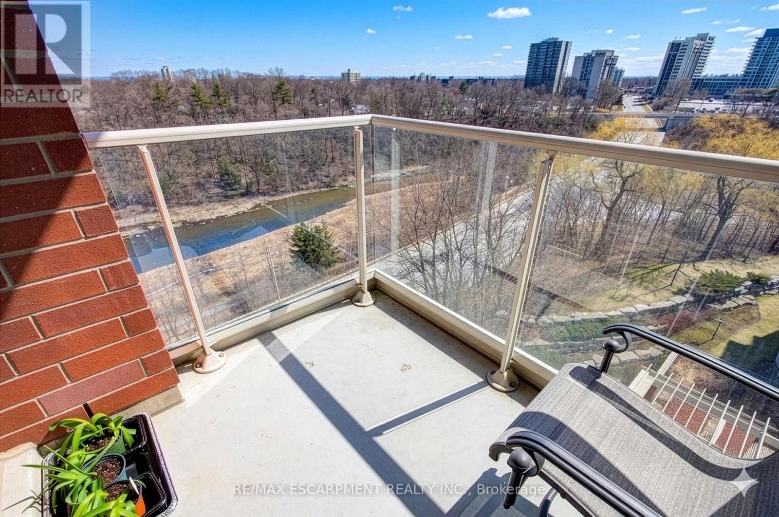 705 - 50 Old Mill Road, Oakville, Ontario  L6J 7W1 - Photo 3 - W12903908