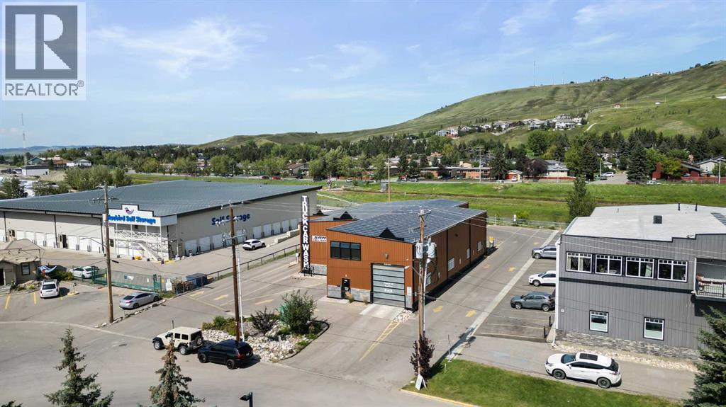 26 Griffin Industrial Point, Cochrane, Alberta  T4C 0A2 - Photo 2 - A2254001