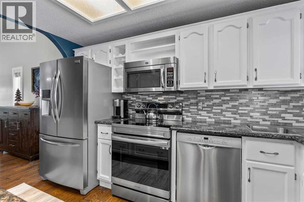 9759 Sanderling Way NW, Calgary, Alberta  T3K 3R8 - Photo 13 - A2297901