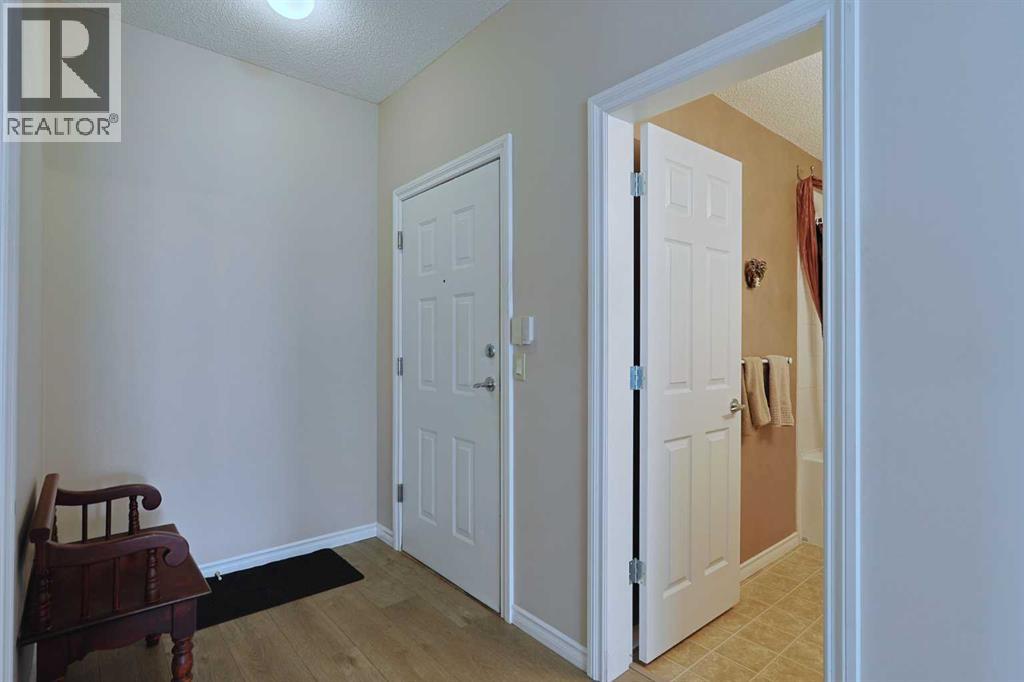 1112, 1010 Arbour Lake Road NW, Calgary, Alberta  T3G 4Y8 - Photo 6 - A2297672