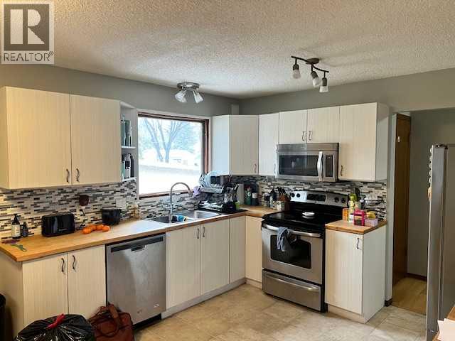 1105 And 1107 11 Street S, Lethbridge, Alberta  T1K 1P7 - Photo 3 - A2298344