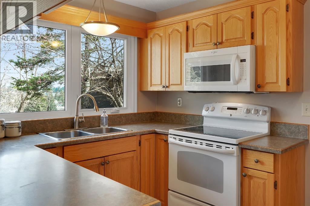 1102 Lake Christina Way SE, Calgary, Alberta  T2J 2R3 - Photo 16 - A2296764