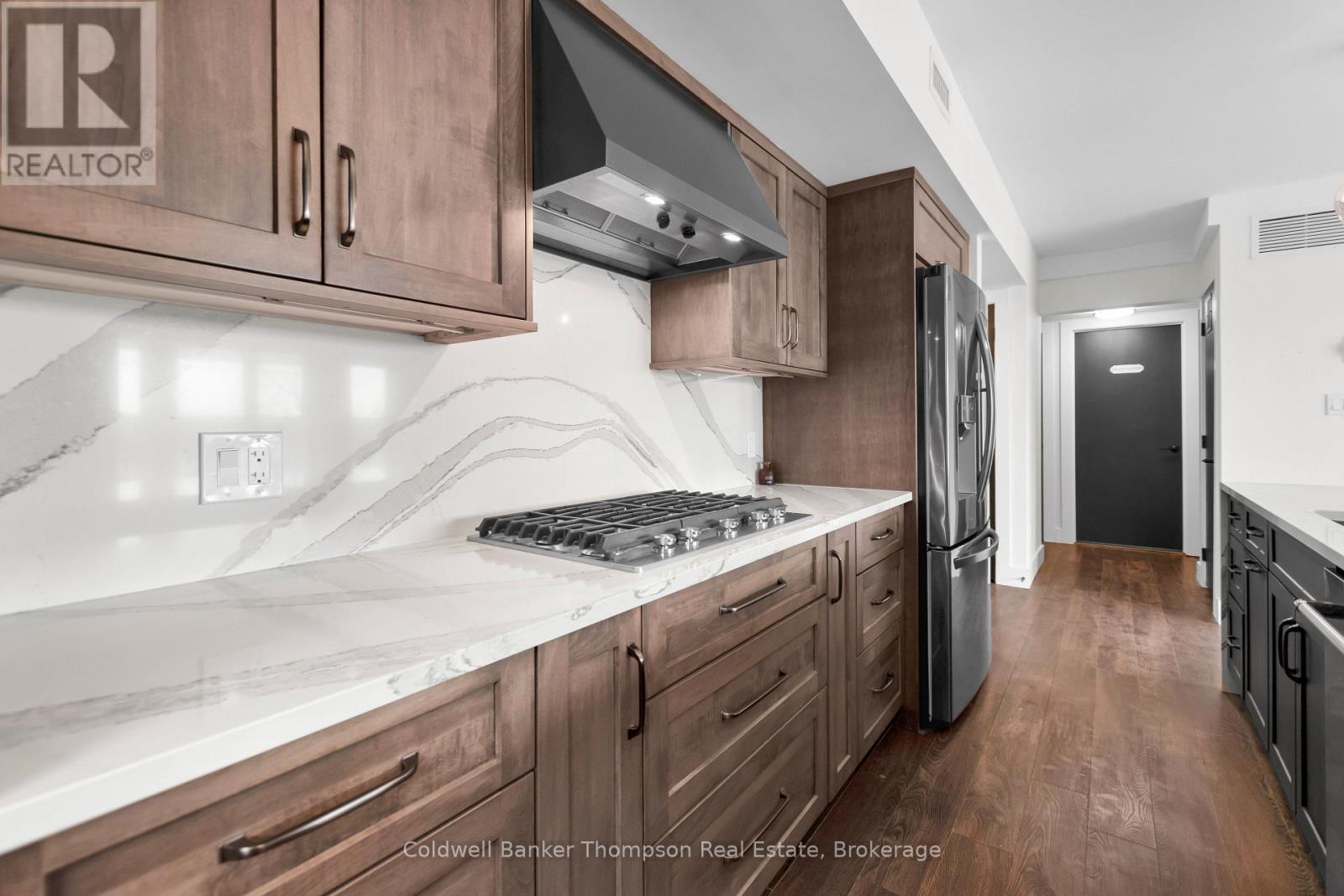 302 - 1 Tree Tops Lane, Huntsville, Ontario  P1H 1A9 - Photo 12 - X12957720