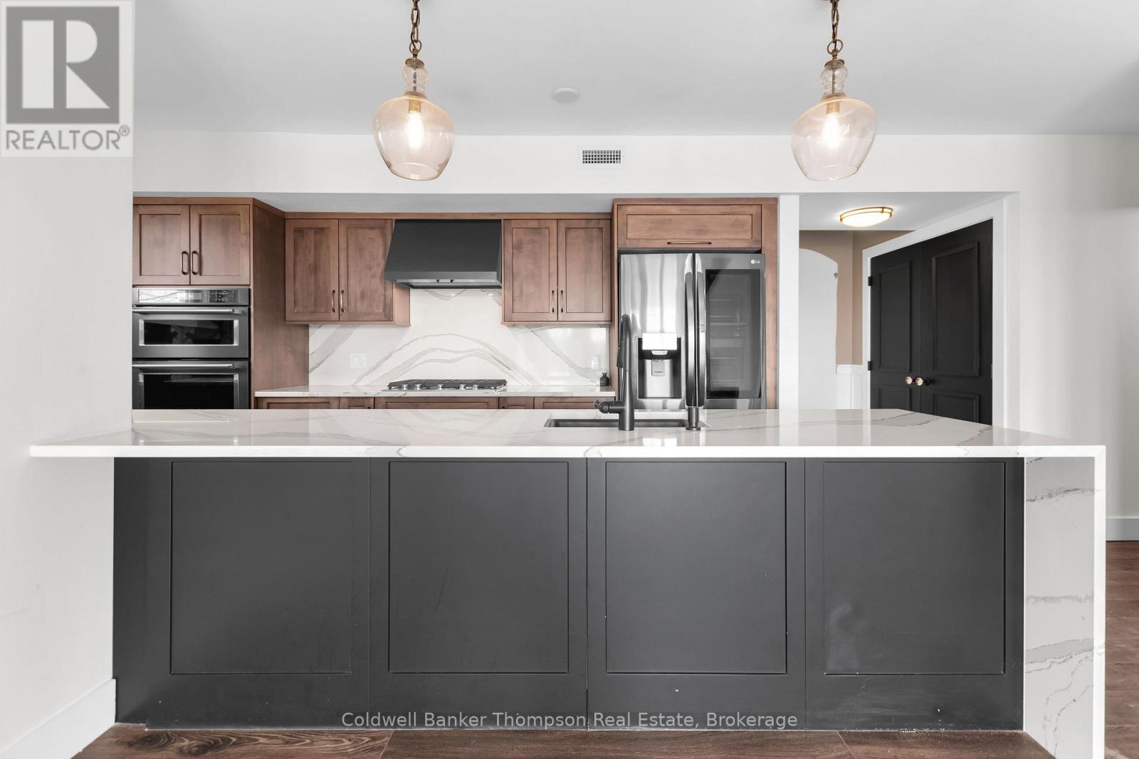 302 - 1 Tree Tops Lane, Huntsville, Ontario  P1H 1A9 - Photo 13 - X12957720