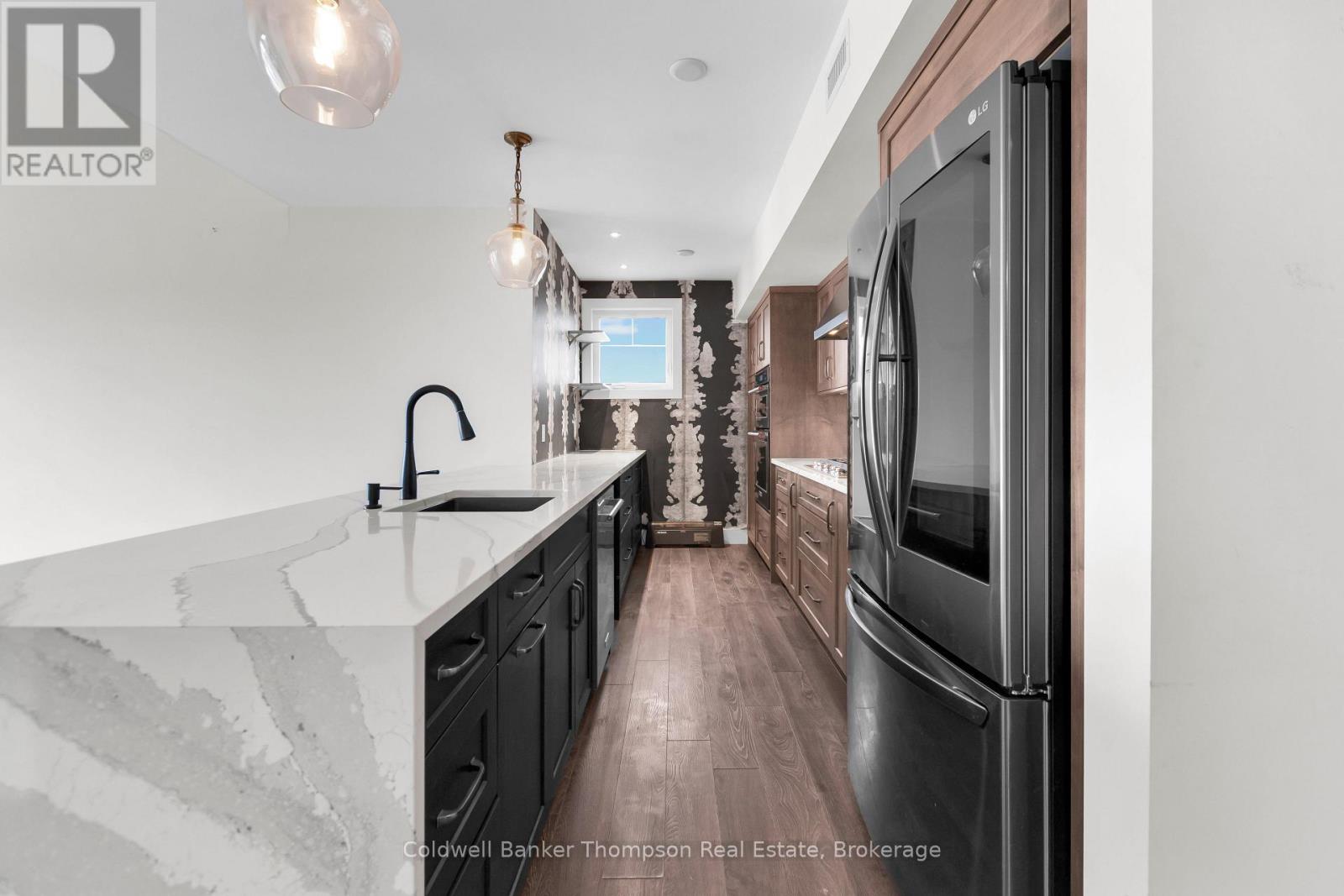 302 - 1 Tree Tops Lane, Huntsville, Ontario  P1H 1A9 - Photo 8 - X12957720