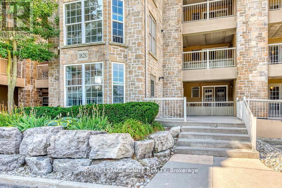 211 - 1820 Walkers Line, Burlington, Ontario  L7M 4V4 - Photo 2 - W12957706