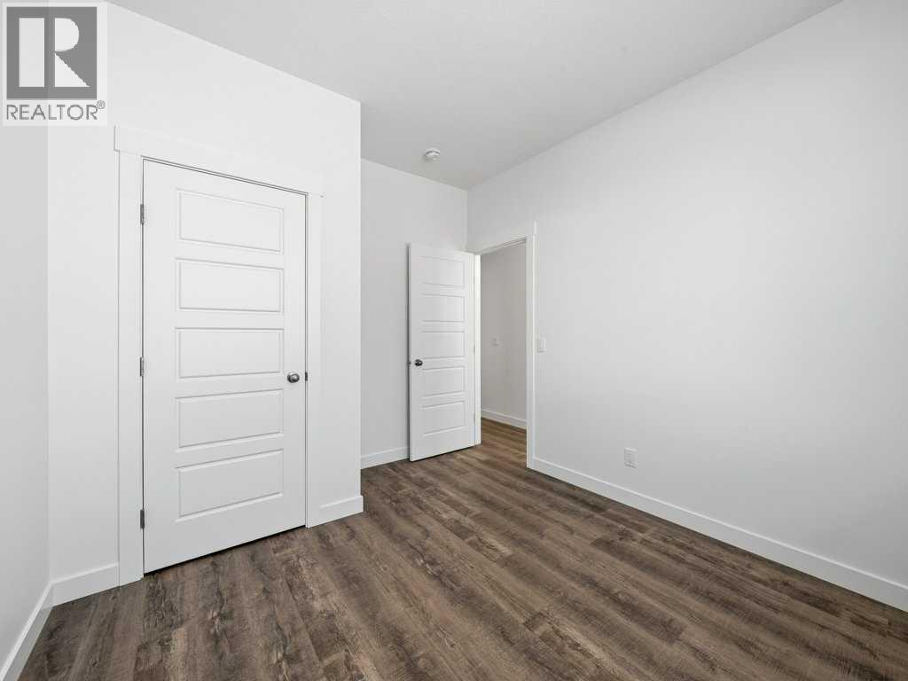 105 Creekstone Manor Sw, Calgary, Alberta  T2X 5W5 - Photo 13 - A2297741