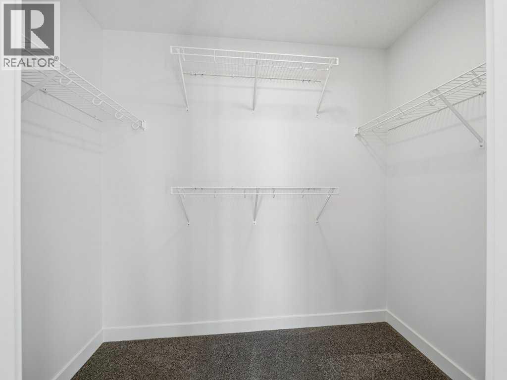 105 Creekstone Manor Sw, Calgary, Alberta  T2X 5W5 - Photo 23 - A2297741