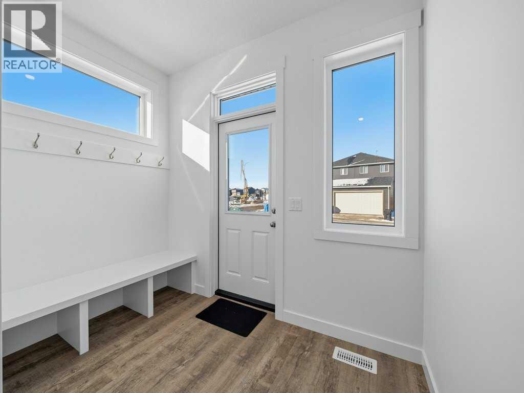 105 Creekstone Manor Sw, Calgary, Alberta  T2X 5W5 - Photo 15 - A2297741