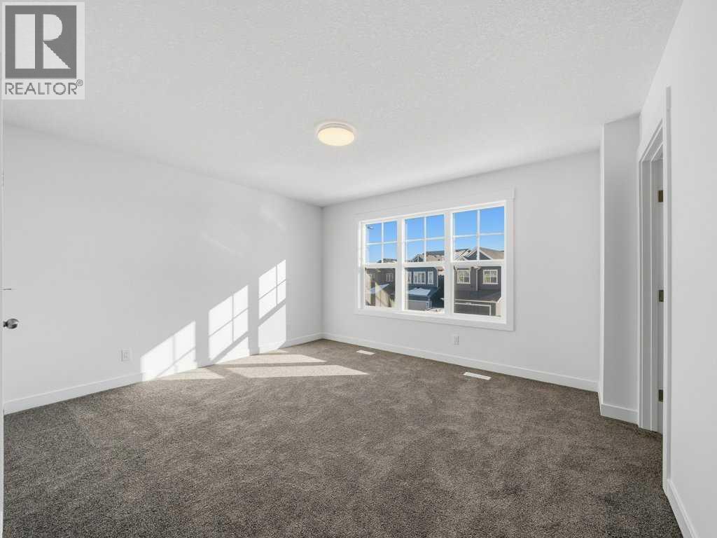 105 Creekstone Manor Sw, Calgary, Alberta  T2X 5W5 - Photo 20 - A2297741